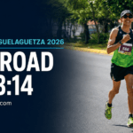 Runner in green Oax Sport kit during the 2026 Maratón Internacional Guelaguetza in Oaxaca.